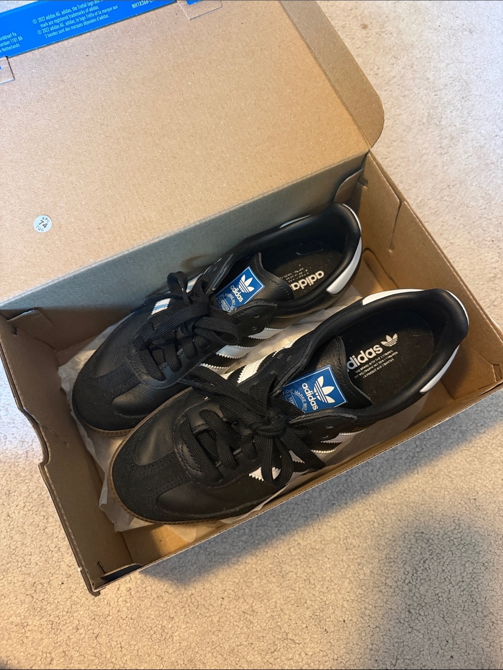 adidas Black Sneakers with White Stripes and Blue Tongue Tab
